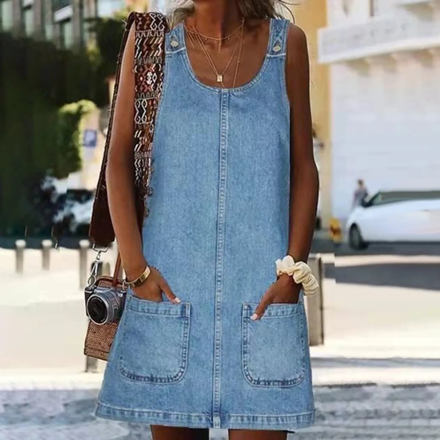 CM | MINI VESTIDO SIN MANGAS.