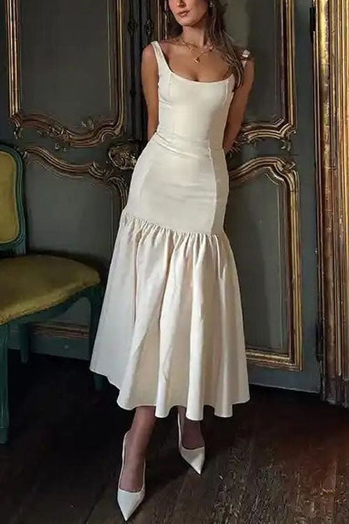 CM | Vestido midi con volantes