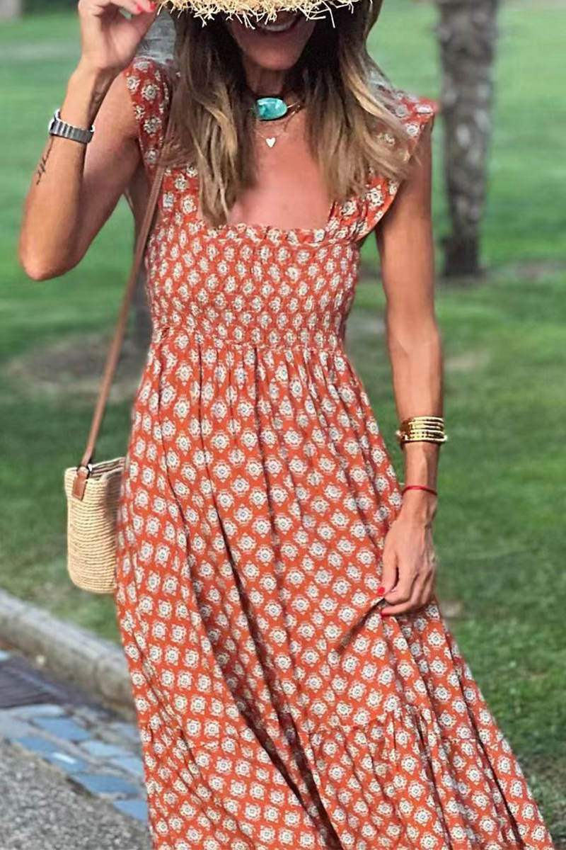 CM | Vestido maxi estampado con volantes
