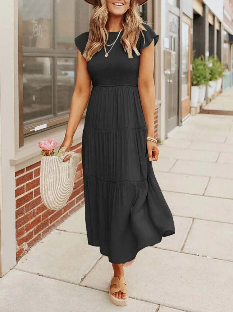 CM | Vestido midi fluido y escalonado