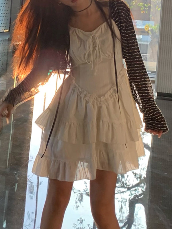CM | Mini vestido blanco con volantes