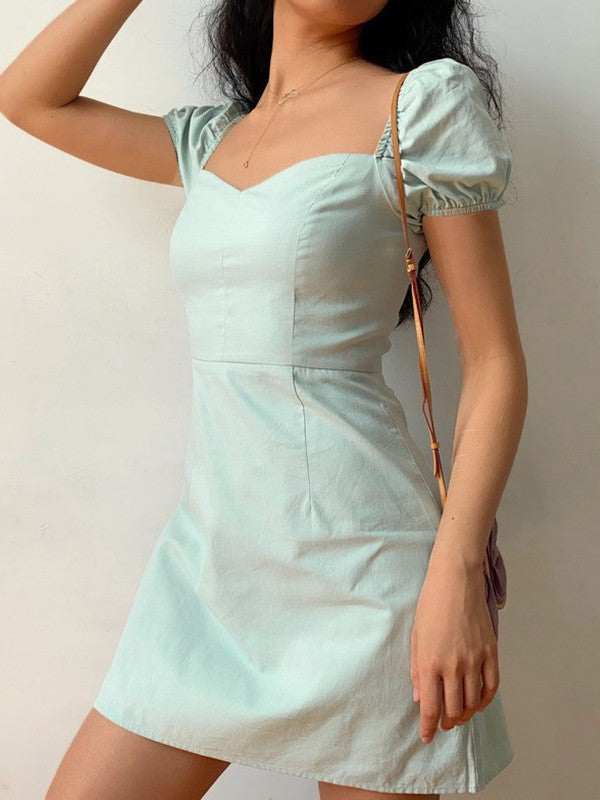CM | Minivestido vintage con mangas abullonadas