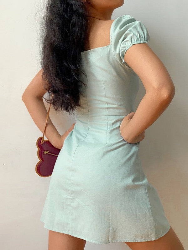 CM | Minivestido vintage con mangas abullonadas