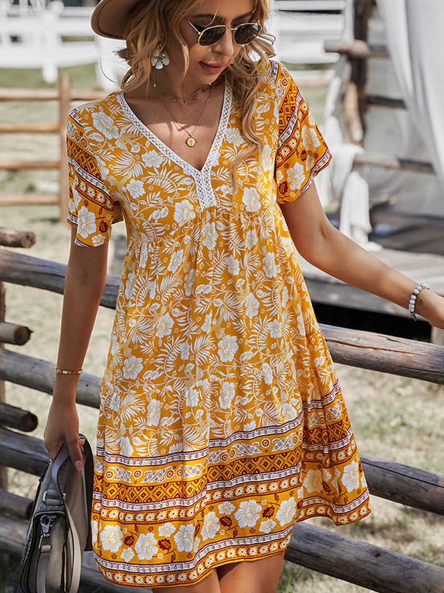 CM | Minivestido bohemio de manga corta y cuello en V