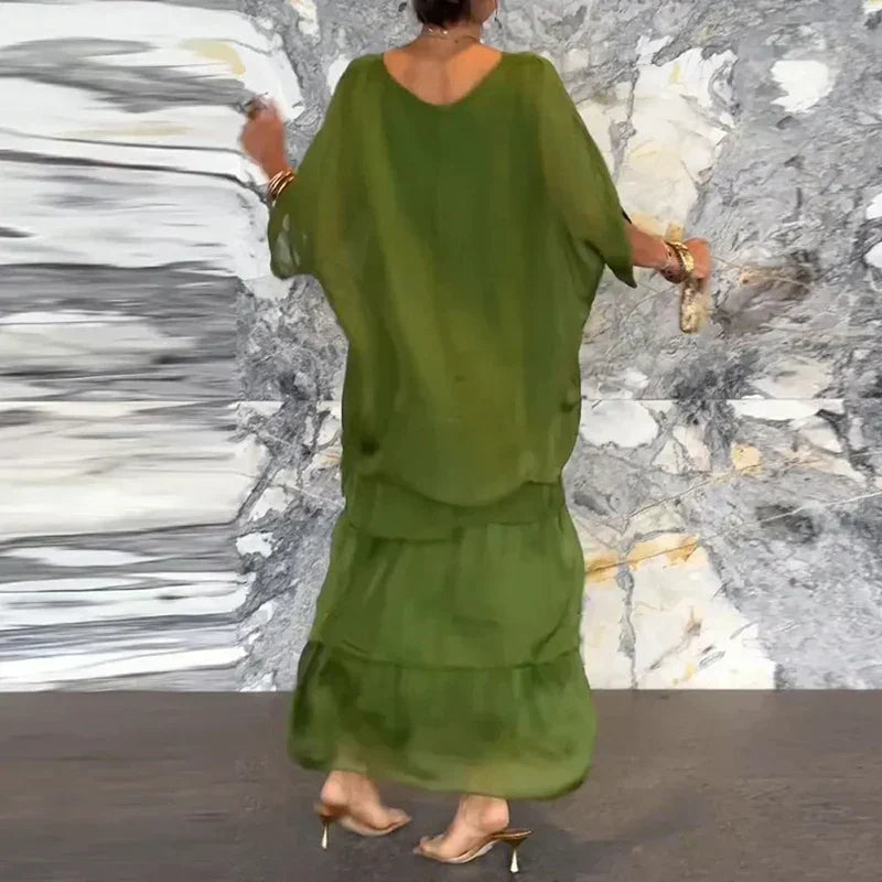 CM | Vestido maxi fluido en un look a capas