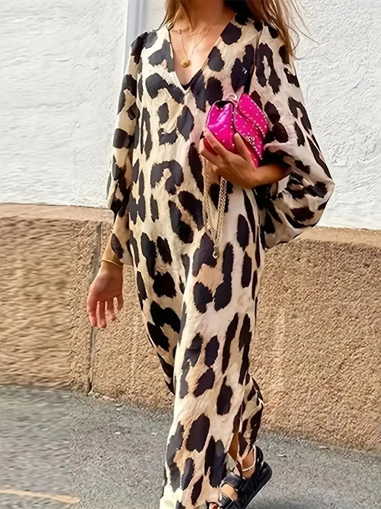 CM | Vestido midi con estampado de leopardo y mangas tres cuartos