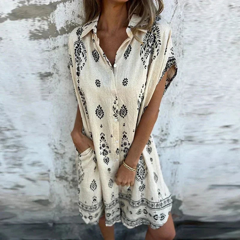 CM | Vestido midi con bolsillos abotonados