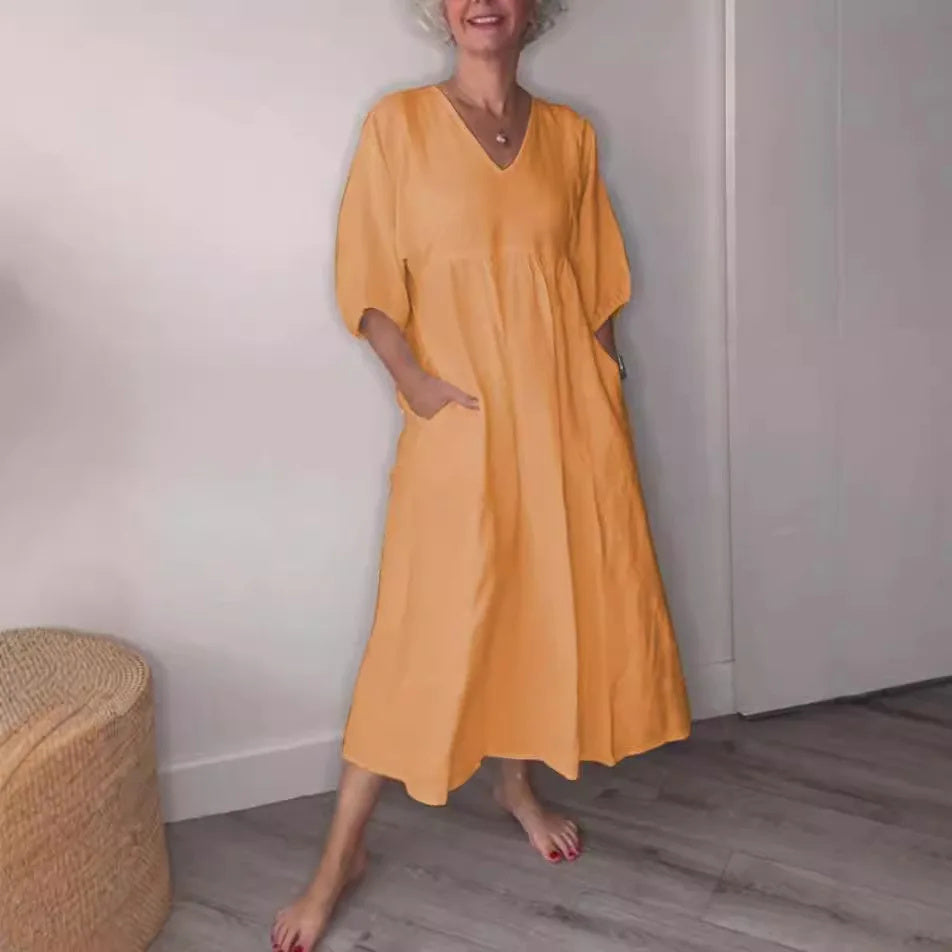 CM | Elegancia relajada maxi vestido con cuello en V