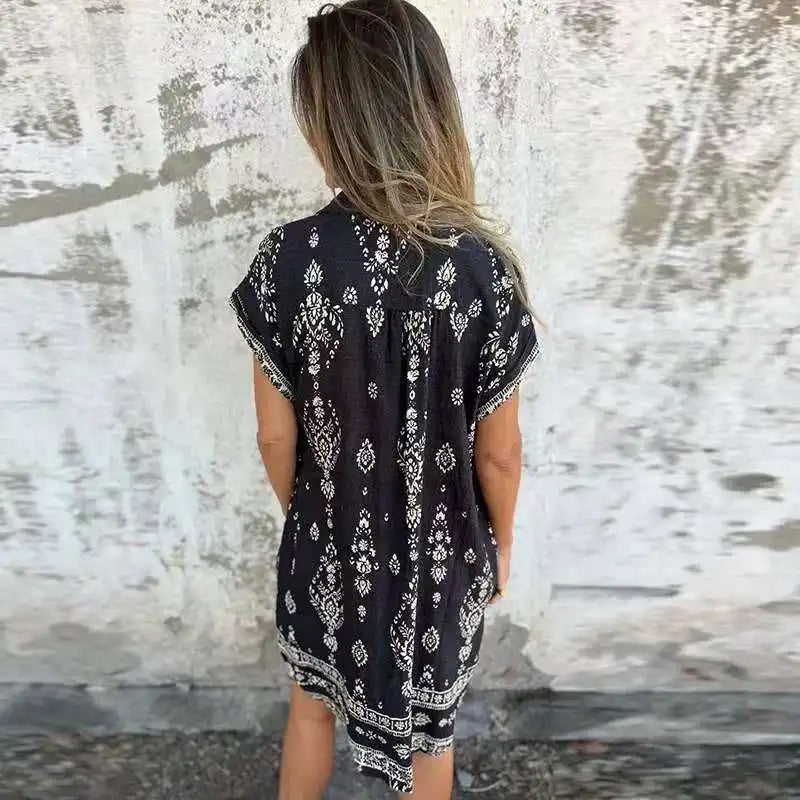 CM | Vestido midi con bolsillos abotonados