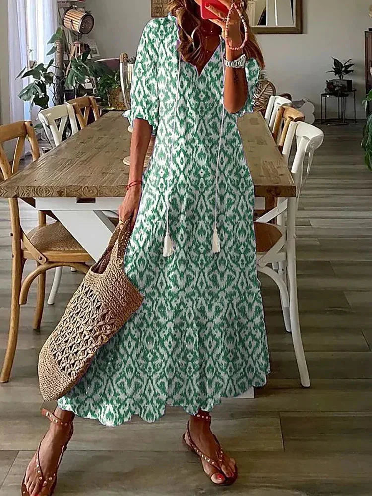 CM | Vestido midi con estampado boho y manga corta