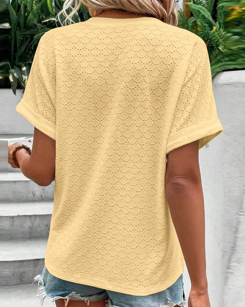 CM | Camisa de manga corta monocolor con escote de muesca y ojales