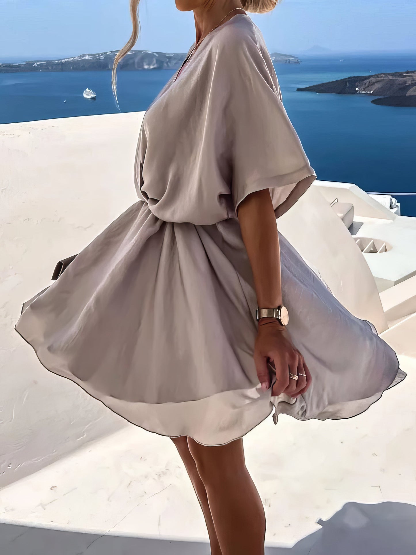 CM | Minivestido holgado de manga corta y cuello en V