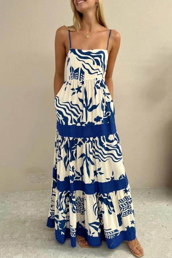 CM | Elegante maxi vestido con volantes y estampado floral