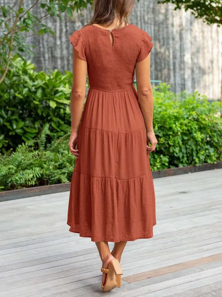 CM | Vestido midi fluido y escalonado