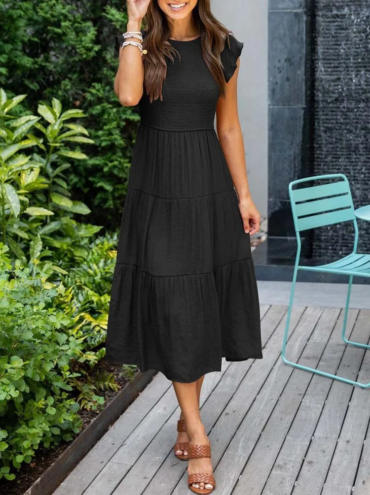 CM | Vestido midi fluido y escalonado
