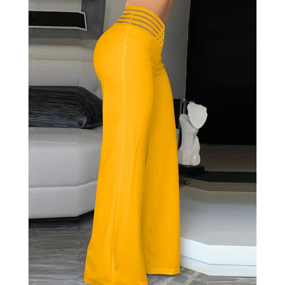 CM | Pantalones acampanados de elastano con cintura cruzada