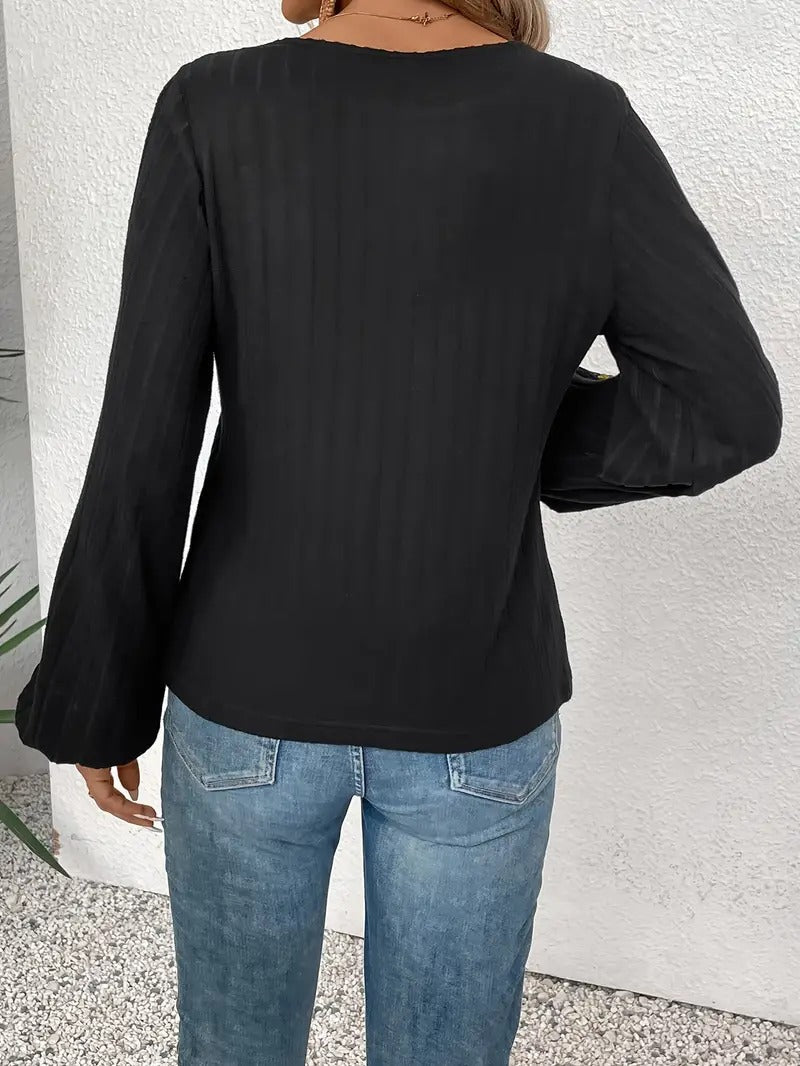 CM | Blusa bordada de manga larga y escote redondo