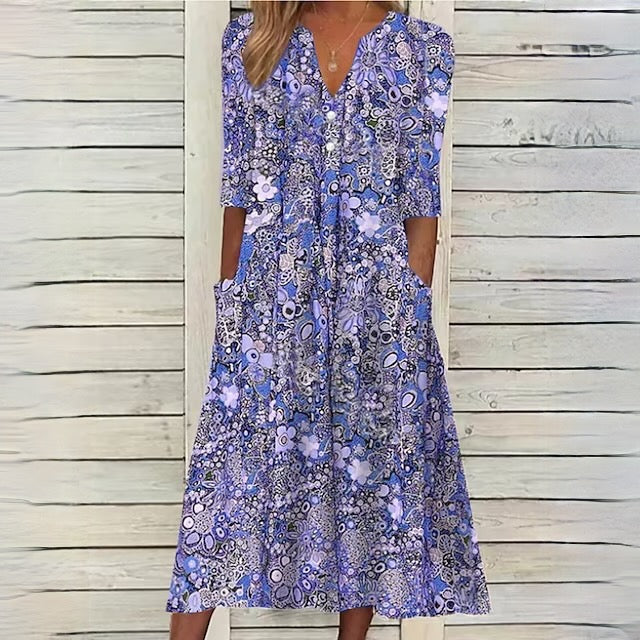 CM | Vestido floral con escote en V y bolsillos laterales