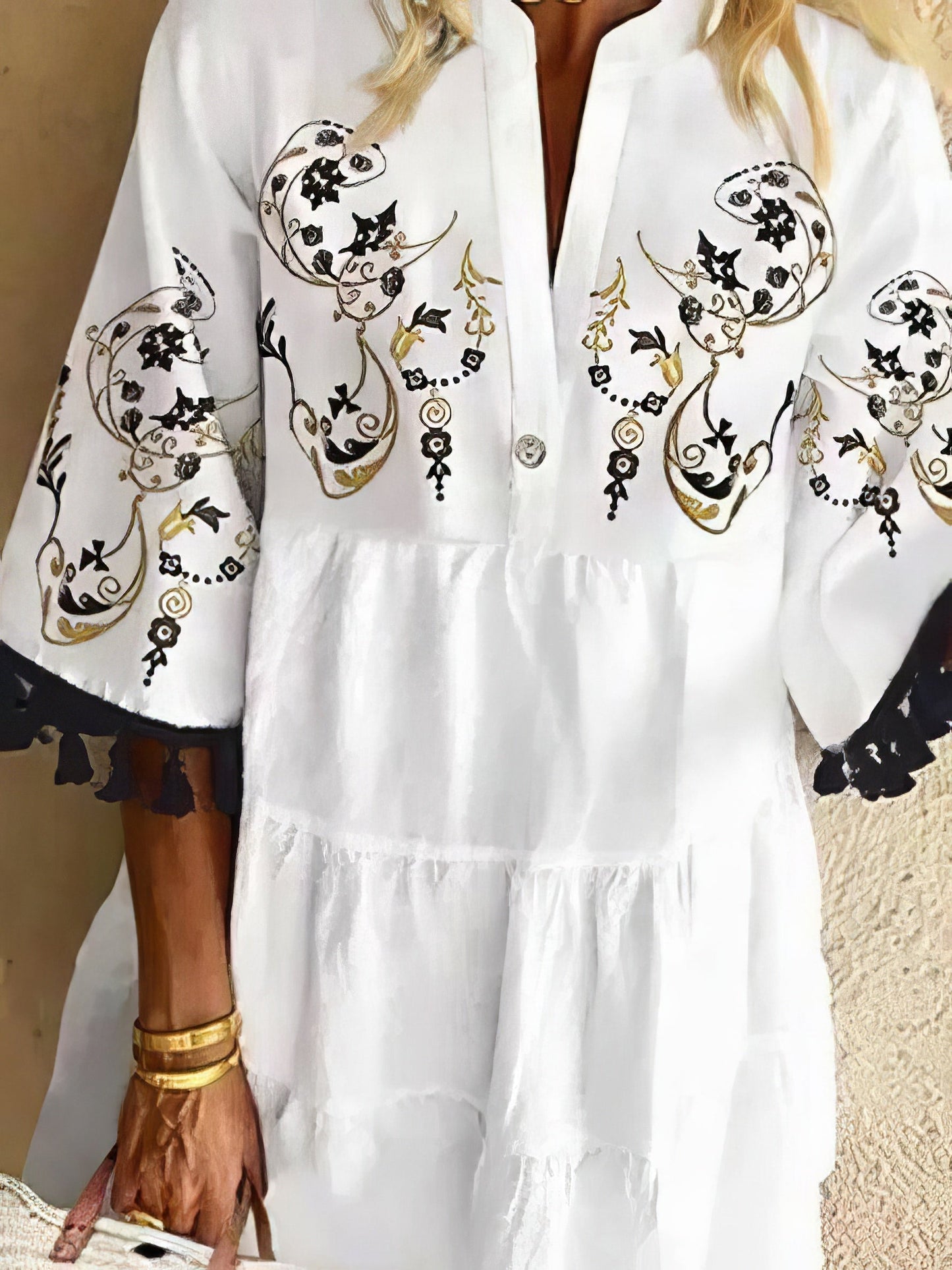CM | Minivestido de flecos con estampado floral y escote en V