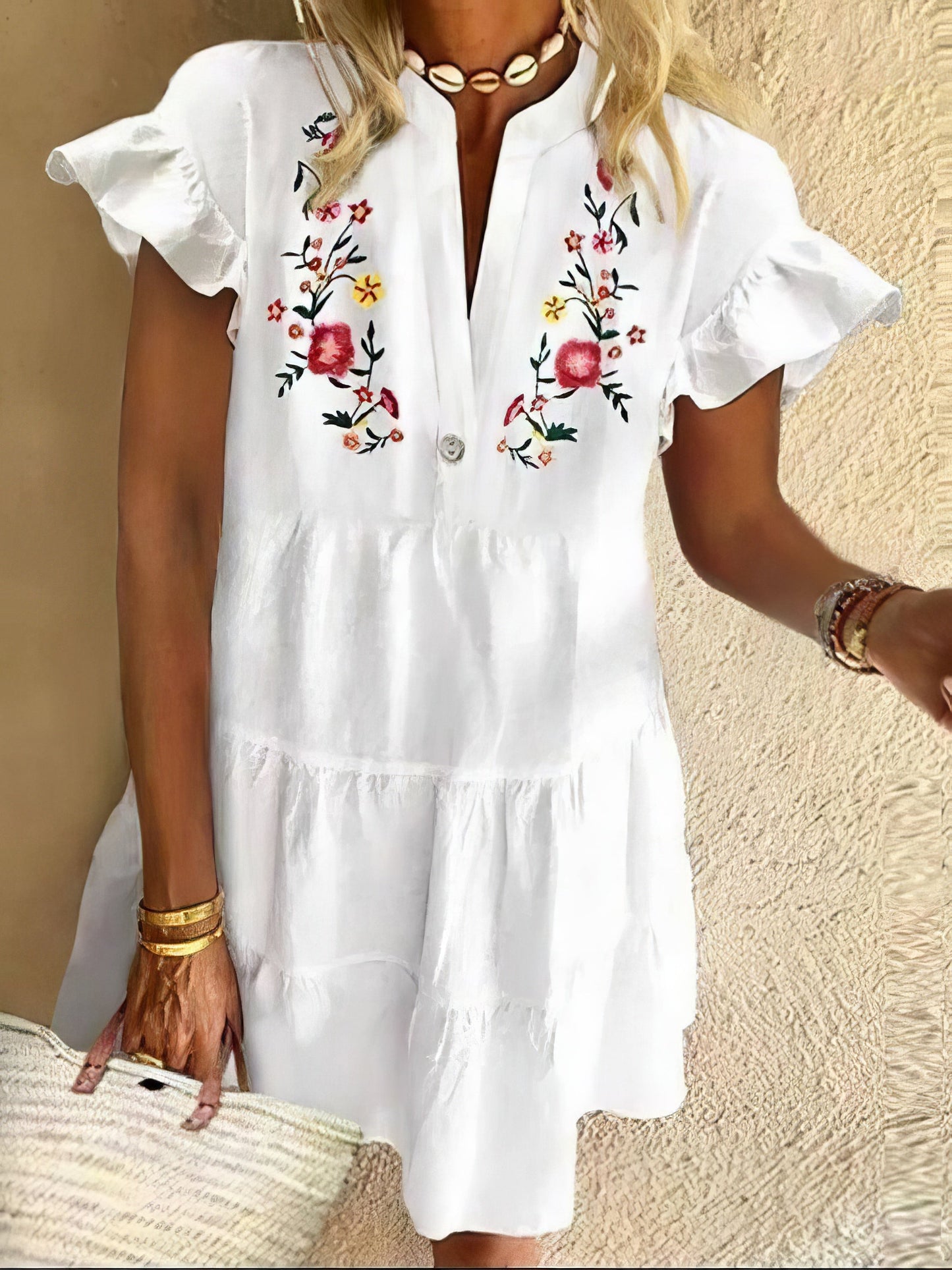 CM | Minivestido de flecos con estampado floral y escote en V
