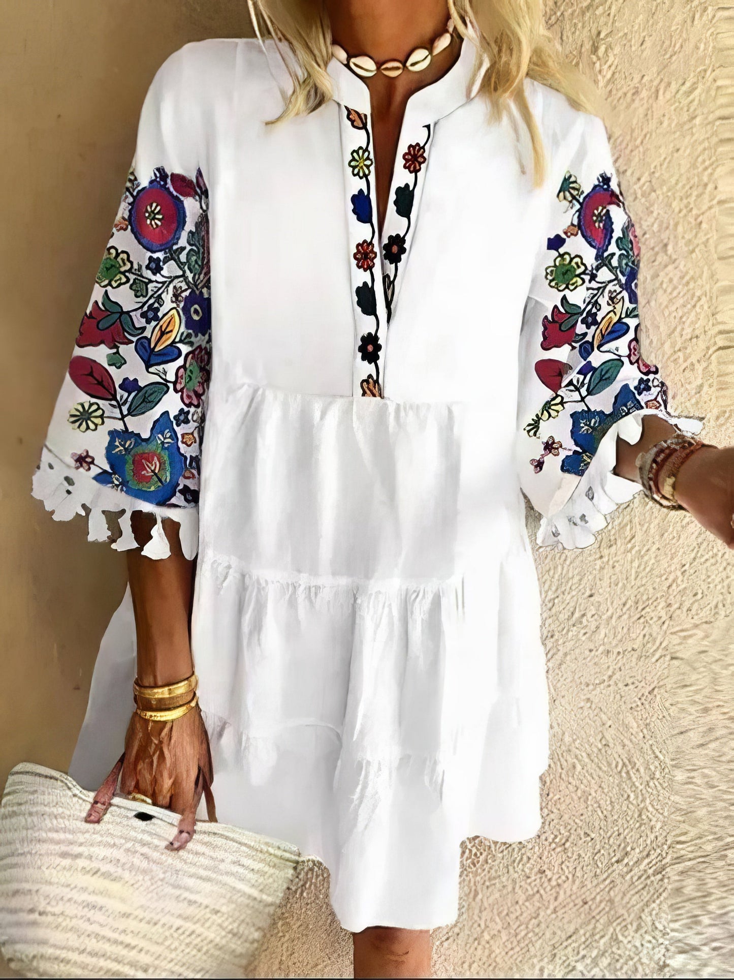 CM | Minivestido de flecos con estampado floral y escote en V