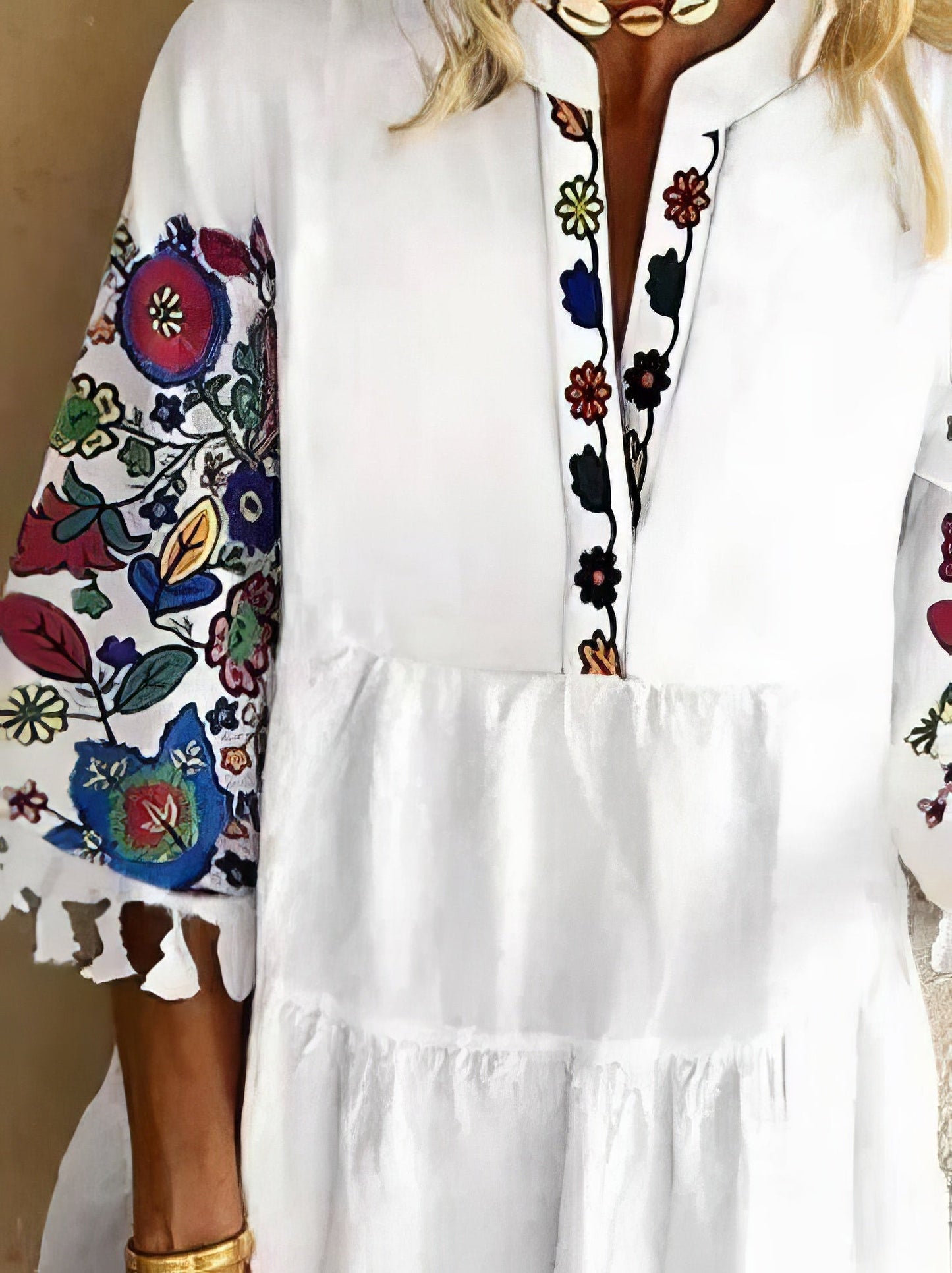 CM | Minivestido de flecos con estampado floral y escote en V
