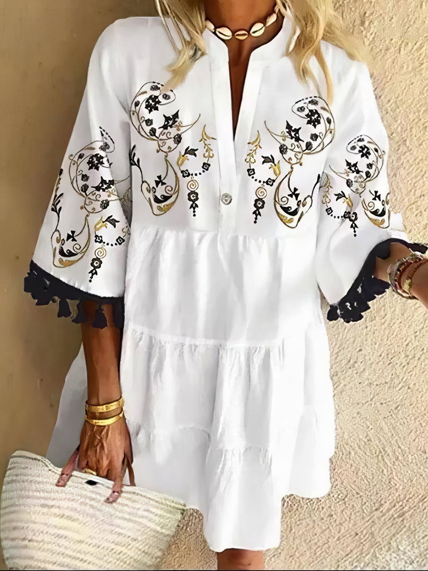 CM | Minivestido de flecos con estampado floral y escote en V
