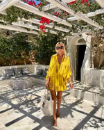 CM | Minivestido chic con escote alto en V