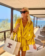 CM | Minivestido chic con escote alto en V