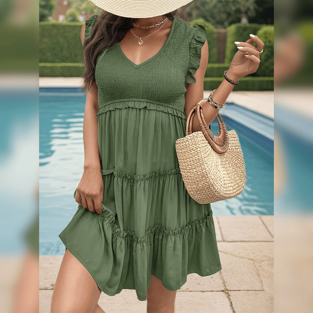 CM | Mini vestido verde relajado con volantes para tus vacaciones de verano