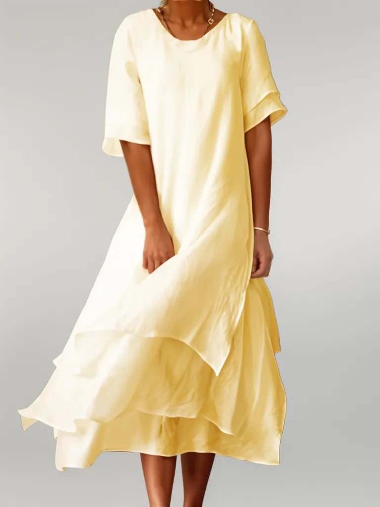 CM | Vestido midi fluido a capas