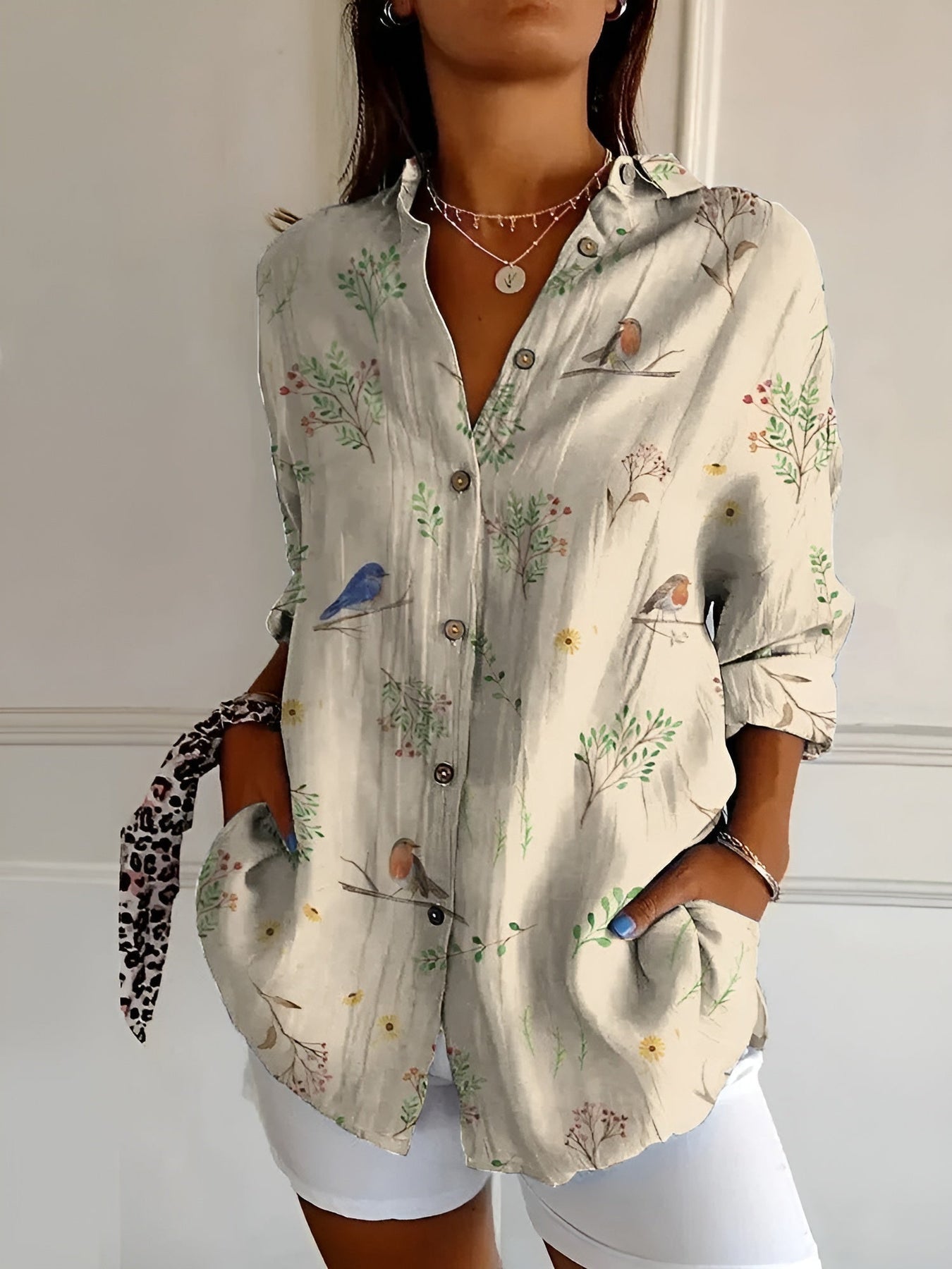 CM | Blusa casual con flores y ondas