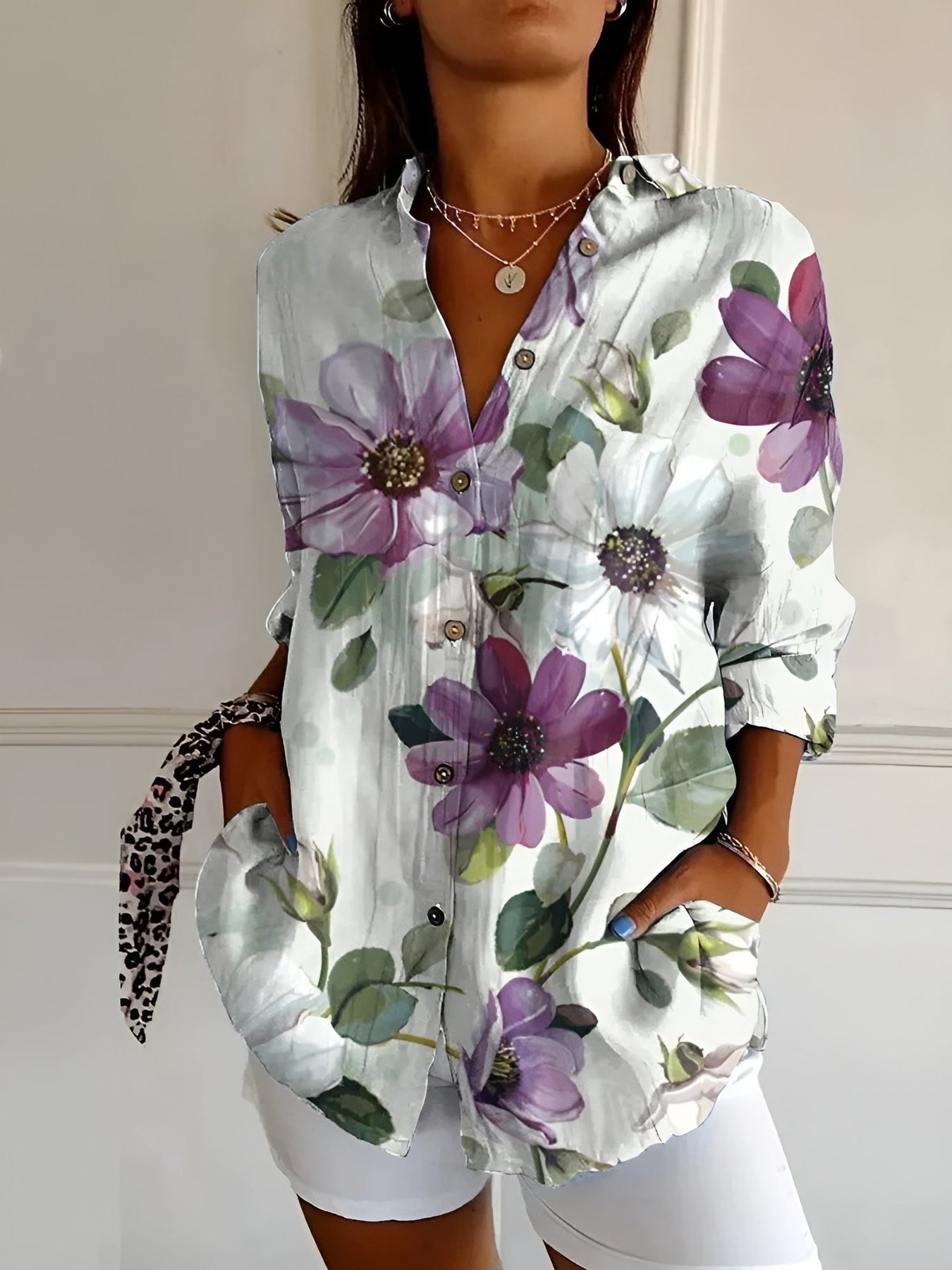 CM | Blusa casual con flores y ondas