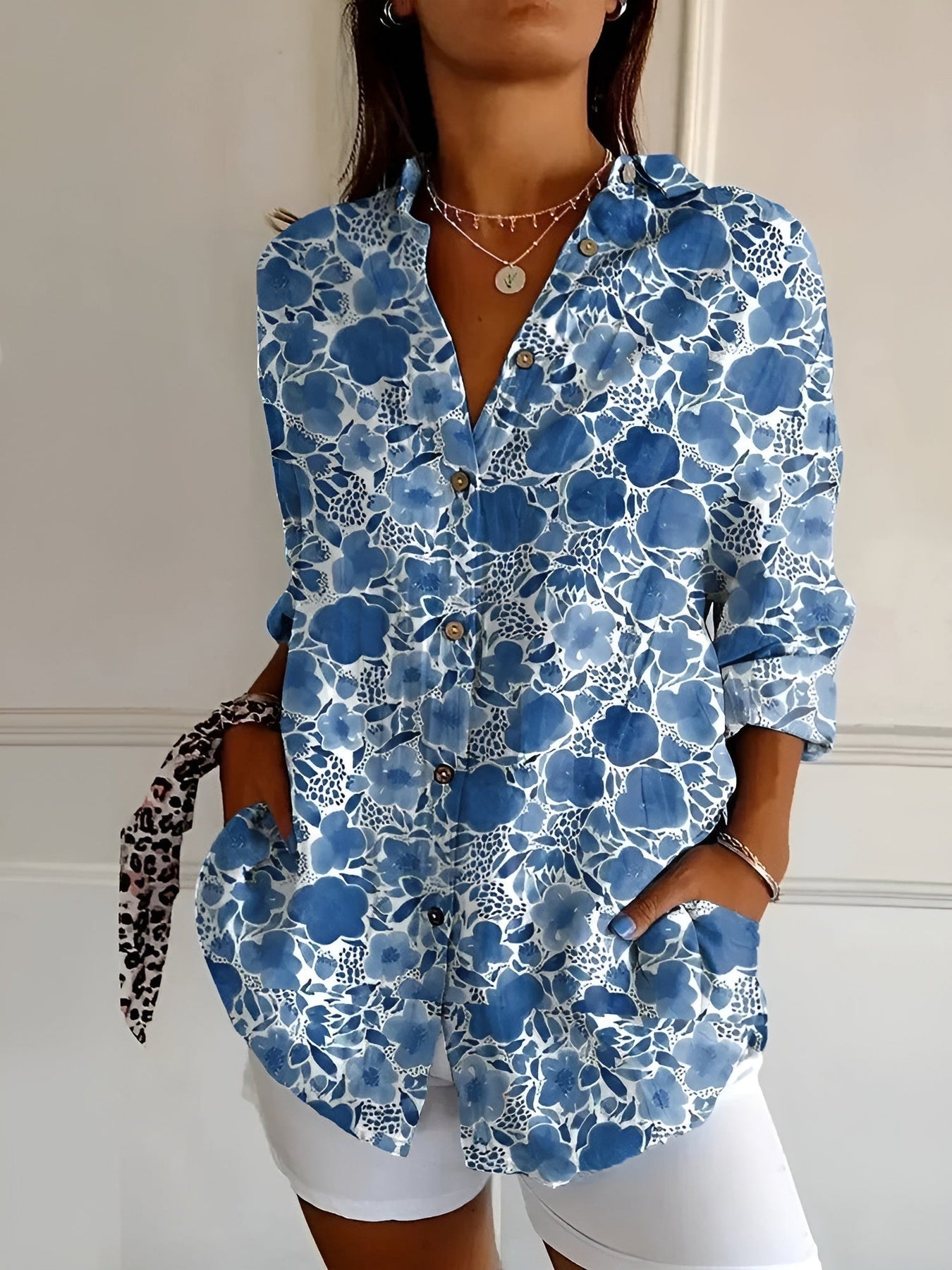 CM | Blusa casual con flores y ondas