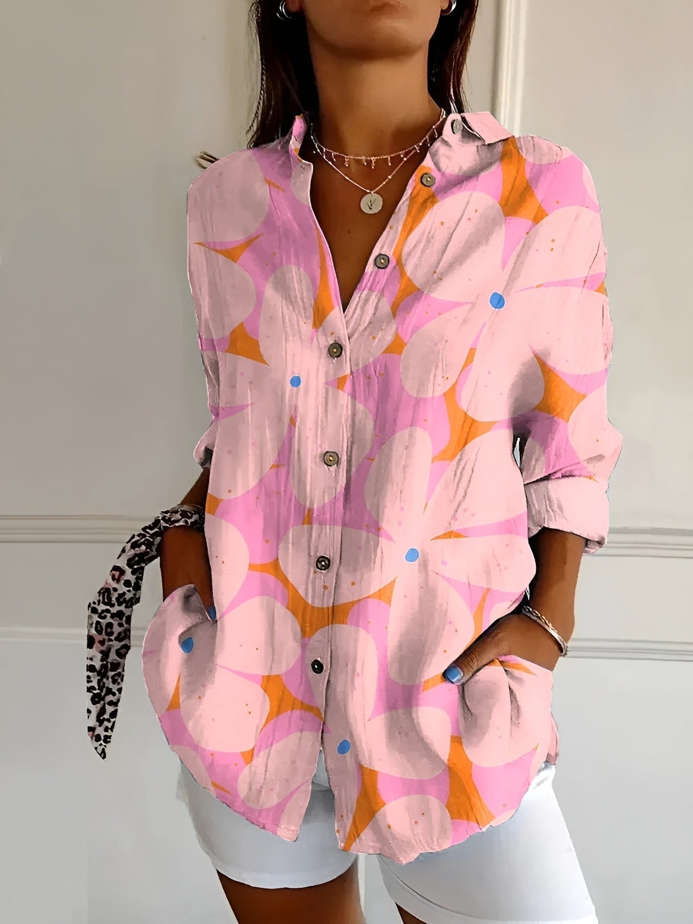 CM | Blusa casual con flores y ondas