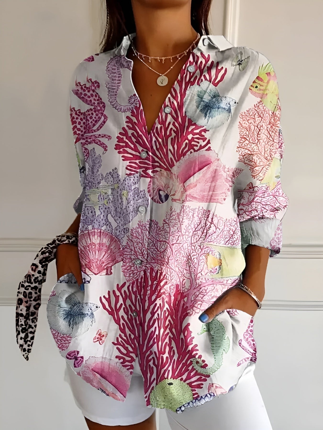 CM | Blusa casual con flores y ondas