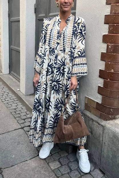 CM | Vestido maxi casual con mangas trompeta y estampado étnico