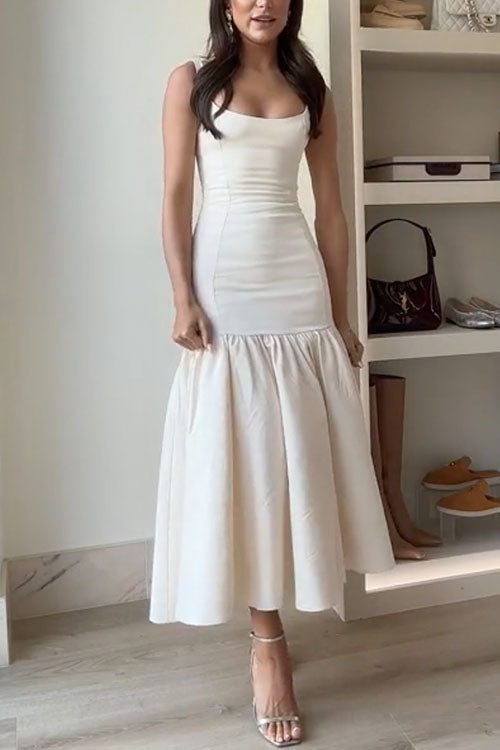 CM | Vestido midi con volantes