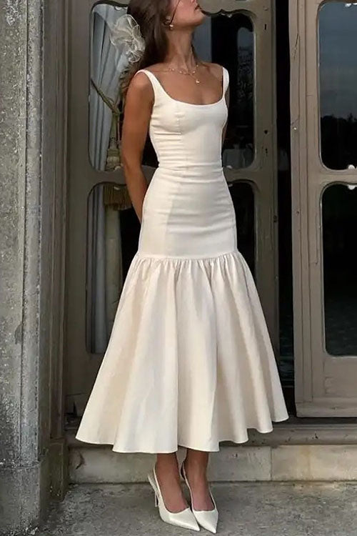 CM | Vestido midi con volantes