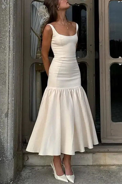 CM | Vestido midi con volantes