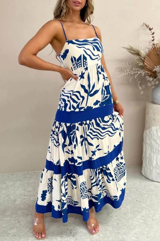 CM | Elegante maxi vestido con volantes y estampado floral