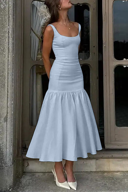 CM | Vestido midi con volantes