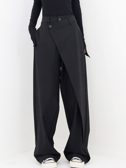 CM | Pantalones asimétricos de moda con perneras anchas