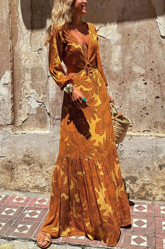 CM | Vestido maxi de manga larga con escote en pico y estampado de girasoles