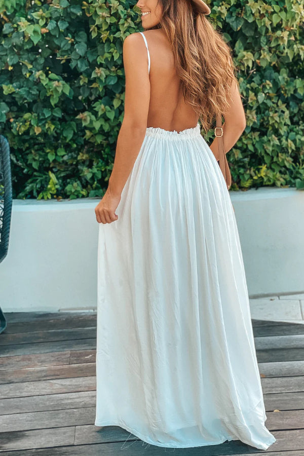 CM | MAXI VESTIDO BLANCO CON ESPALDA ABIERTA Y BAJO DESHILACHADO