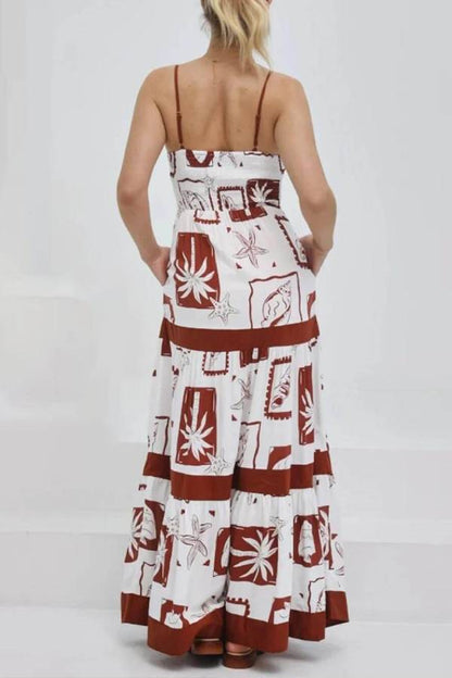 CM | Elegante maxi vestido con volantes y estampado floral