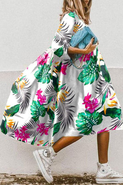 CM | Vestido midi vintage con estampado floral y bajo alto