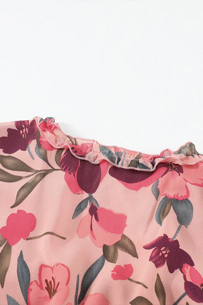 CM | maxi vestido escotado con volantes y estampado floral en rojo pastel