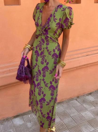 CM | Vestido midi estampado de manga corta y escote pronunciado