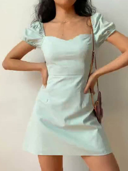 CM | Minivestido vintage con mangas abullonadas